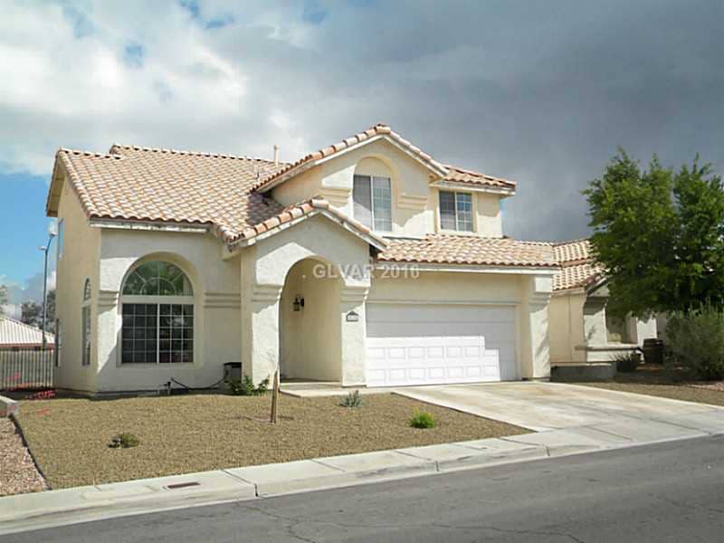 Property Photo. Exterior front includes new desert landscaping.