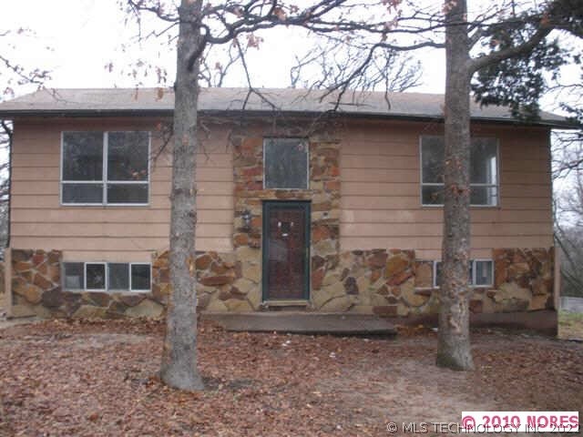 Picture of Front of House a Year ago.  See next pi