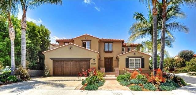 Nicely placed on a corner lot, with custom garage 