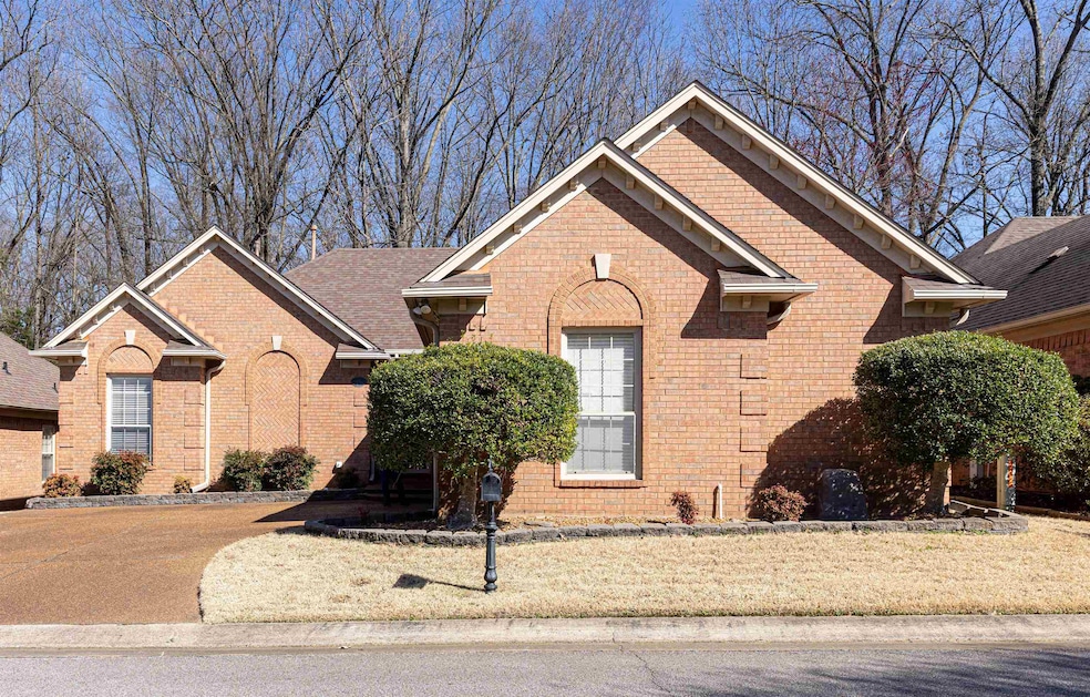 View of front of house with brick siding