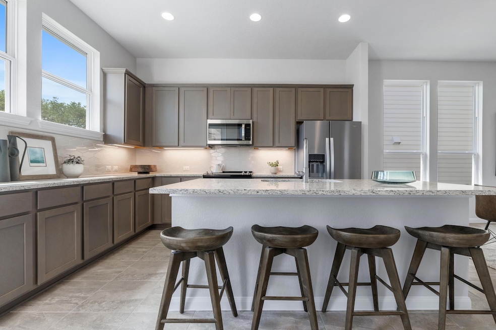 Kitchen featuring stainless steel appliances, rec