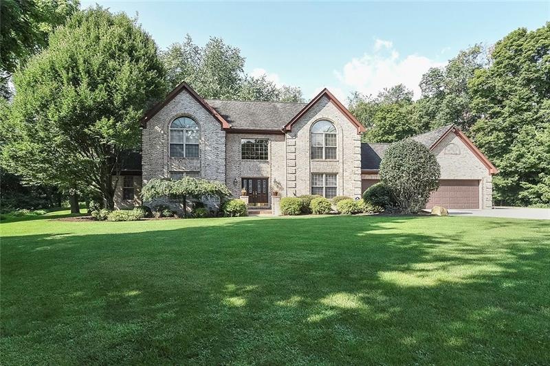 Quality Built Custom Home on a 5 Acre Wooded Parad
