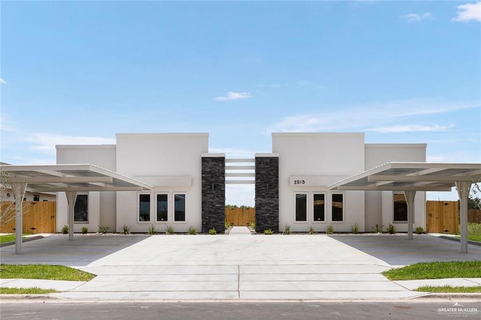 View of front facade with a carport