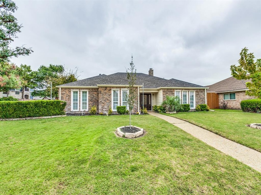 Beautiful one story transitional home on a large c