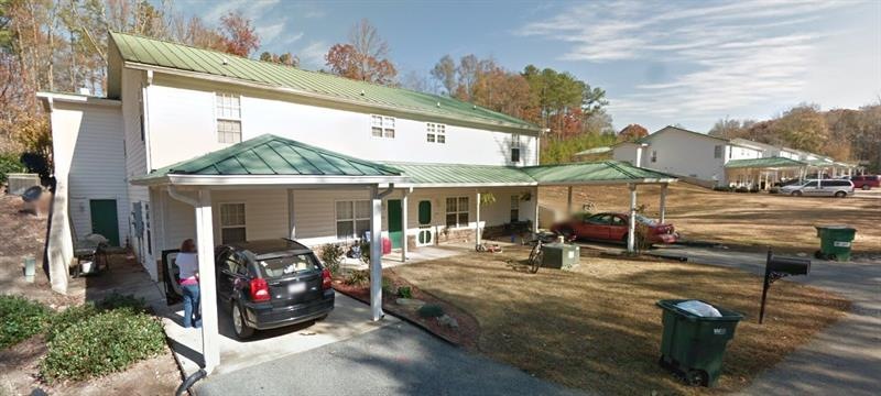 5 Buildings, 20 Units Total. Room to build 5-6 more buildings. All units are on one level, leased.  Lease includes all utilities, cable and trash.