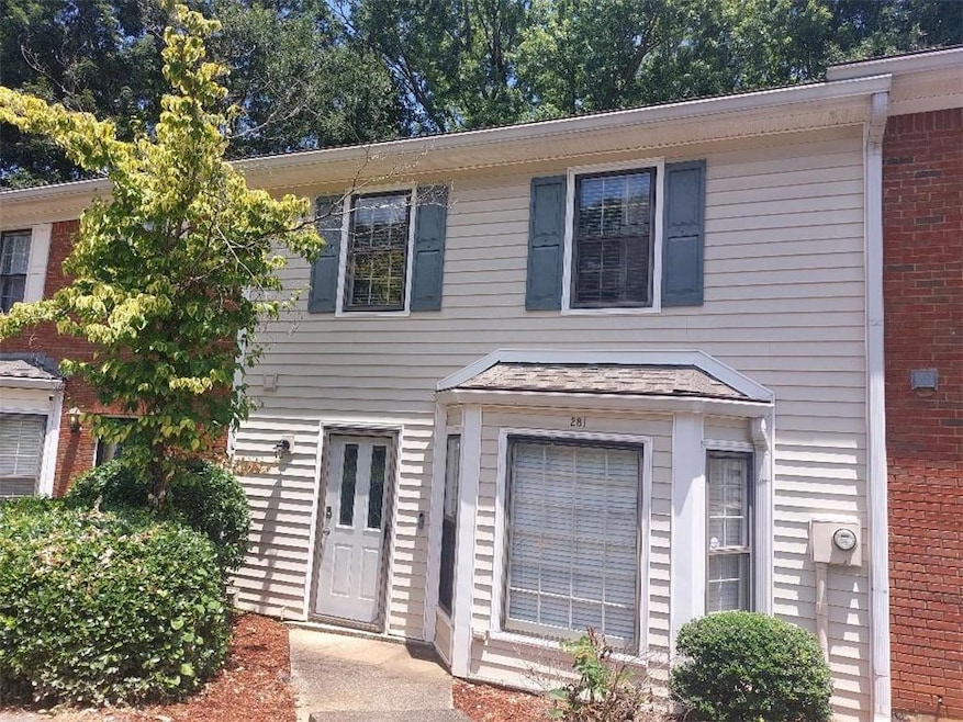 View of front of home featuring brick siding
