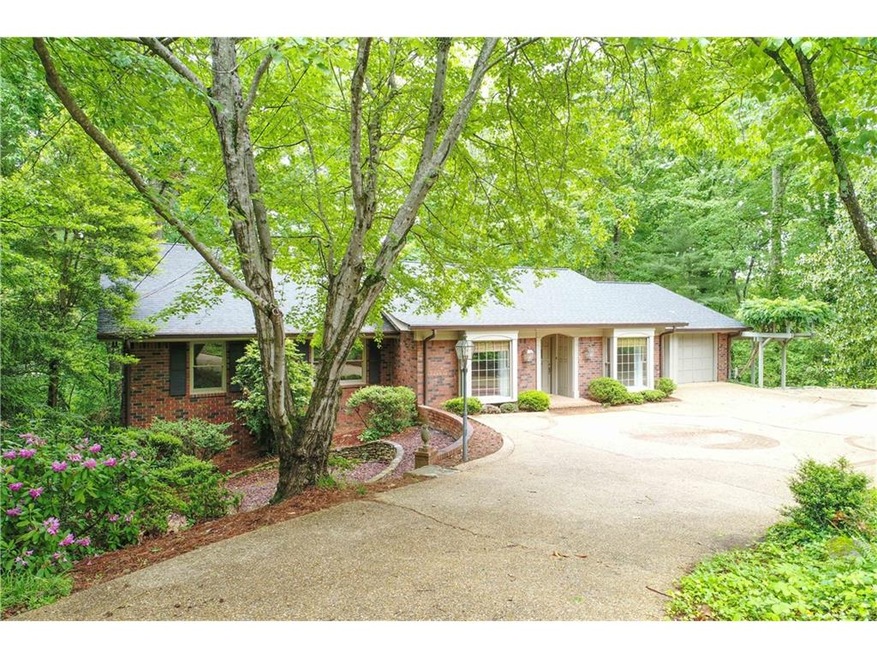 Amazing wooded lot and tons of parking