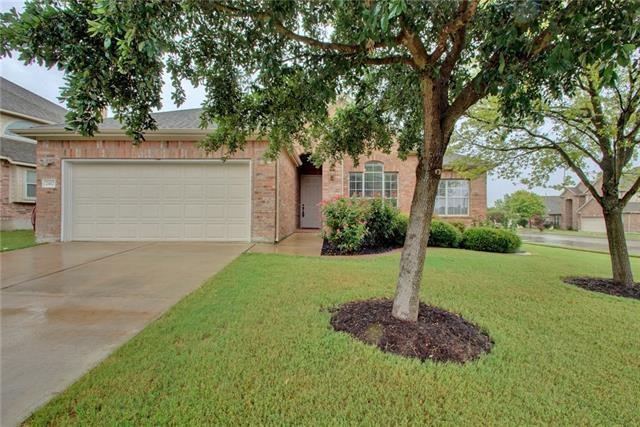 Mature front yard with great shade and a thick car