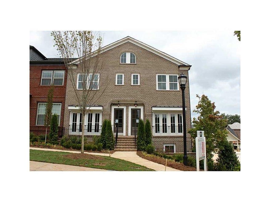 Exterior Front. Beautifully landscaped front yard.