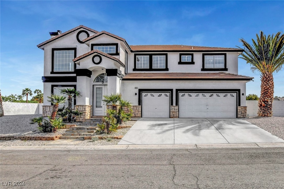 Traditional-style home with an attached garage, st