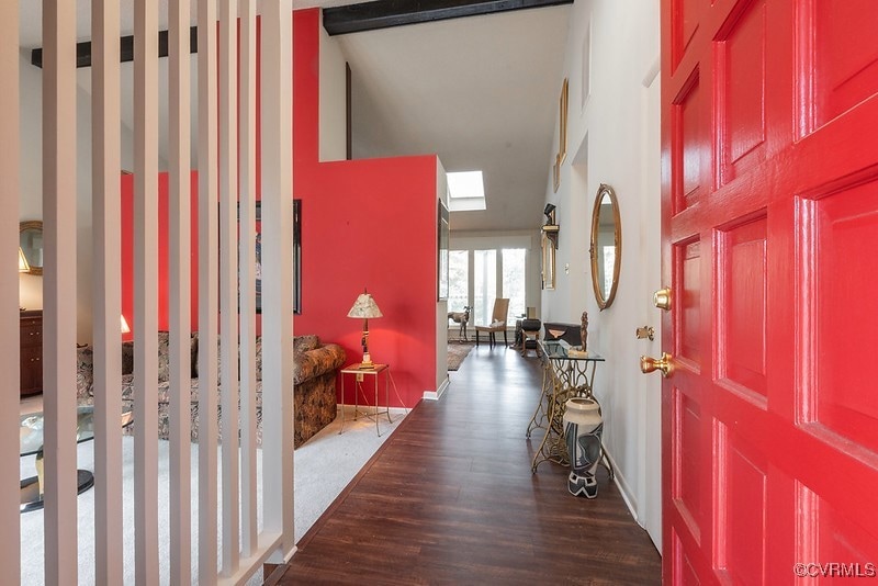 Entryway featuring dark hardwood / wood-style floo