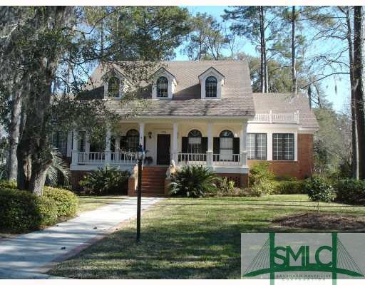 Exterior Front. Spacious Long Point brick home has