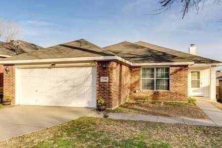 Ranch-style home with a garage