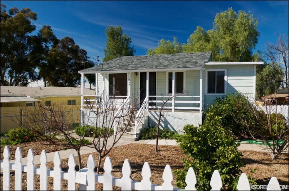 Darling curb appeal with mature fruit-bearing tree