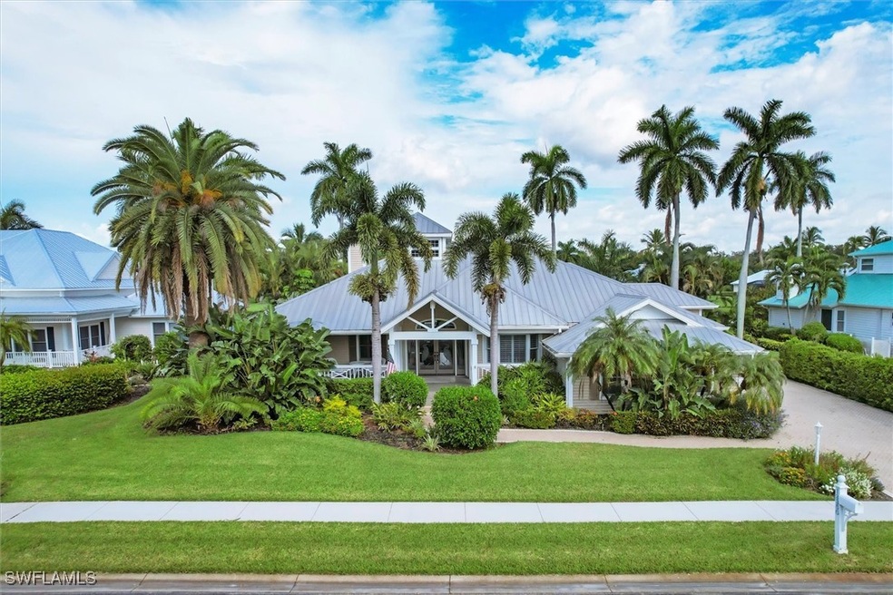 View of front facade with lanscaped lawn