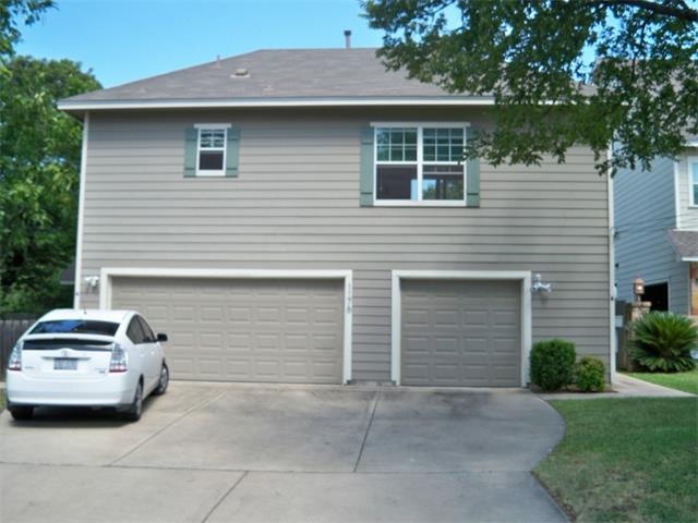 Located over the garage, facing street