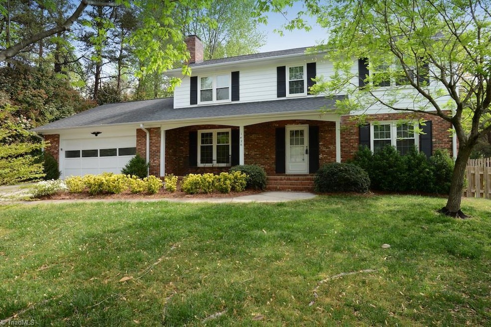 Situated on a beautiful corner lot in Emerywood Forest