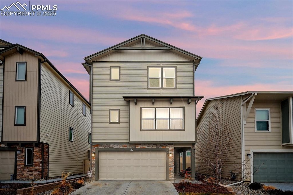 View of front of home with 2 car garage