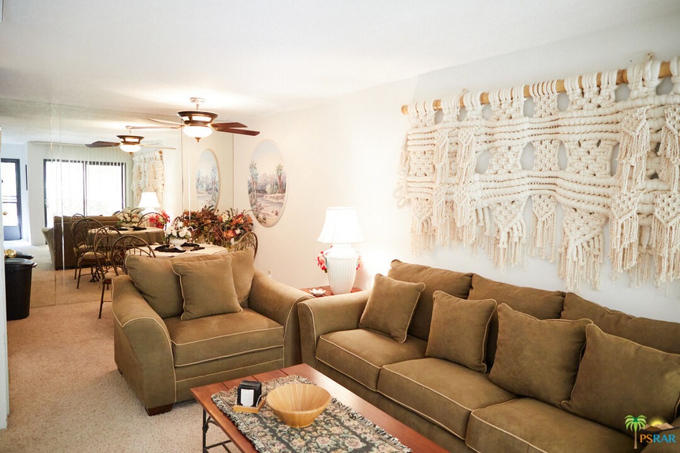 Main living space . Wall hanging hand woven by one
