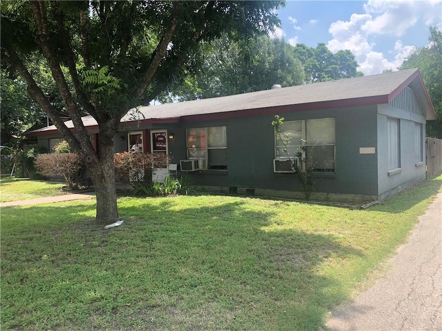 Single story home featuring a front yard and cooling unit