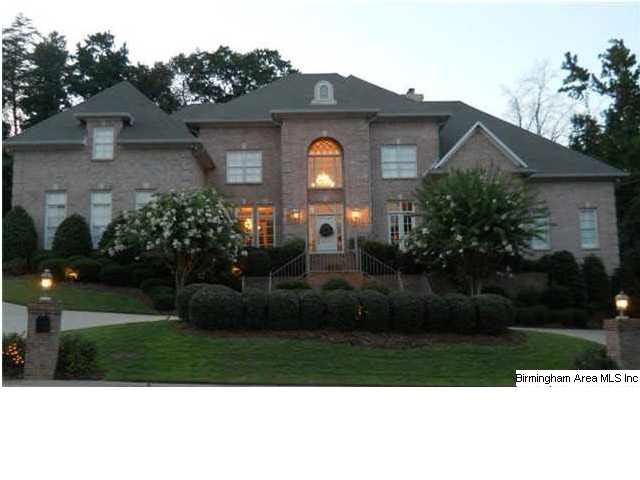 This mpressive custom home is located one block fr