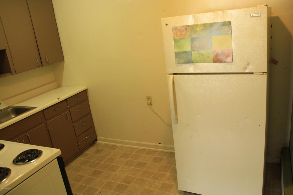 8820 Golovin St unit 5, Anchorage, AK 99507 - photo 1