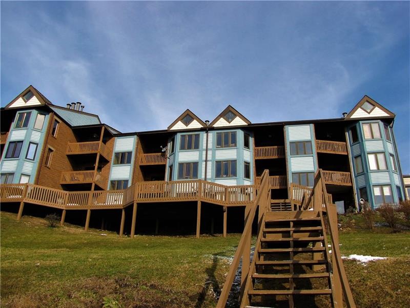View of the front of the building. To access units