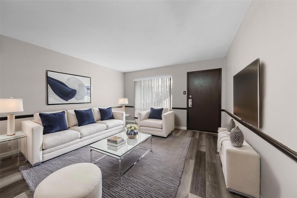 Living room featuring dark hardwood / wood-style f