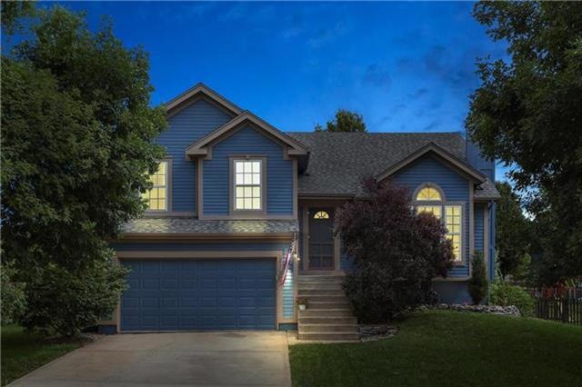Night blooms in this traditional split level home.