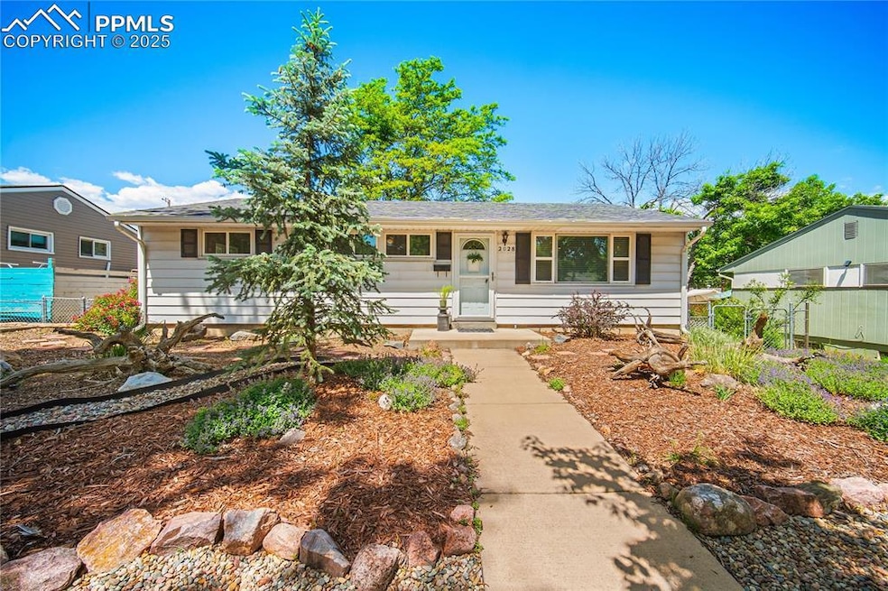 Fully landscaped with easy to care for xeriscape front yard.