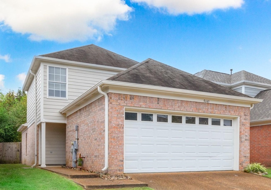 Front facade with a garage
