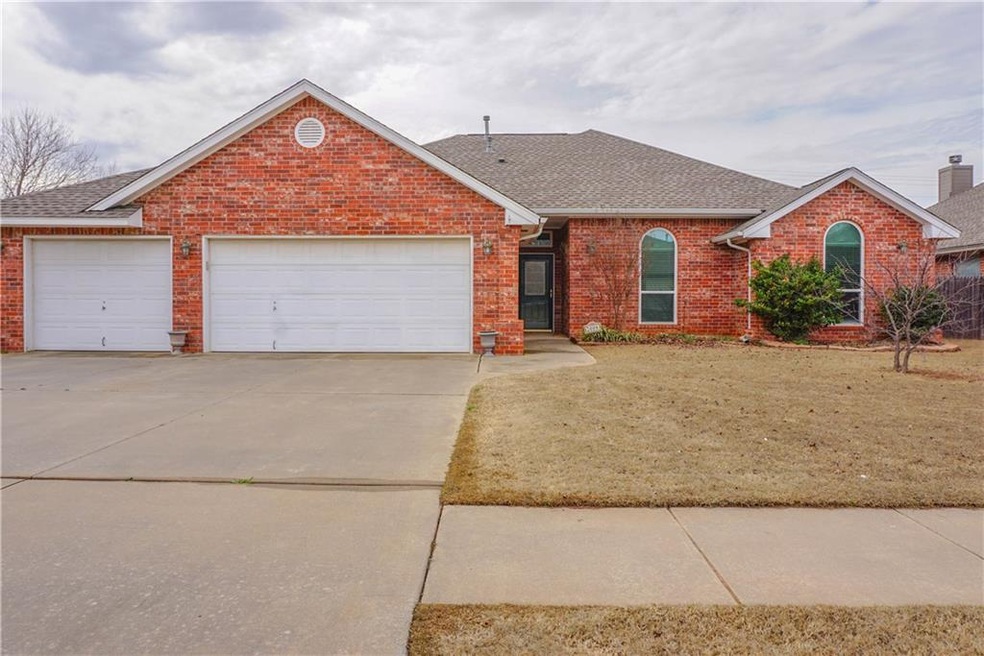 Front of home with 3 car garage