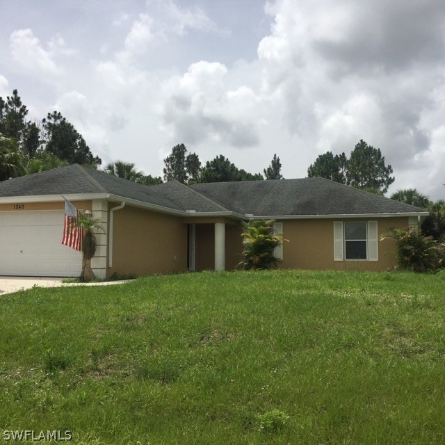 1240 Hillcrest St E, Lehigh Acres, FL 33974 - photo 1