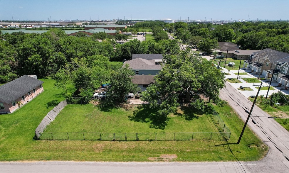 Upper left building with green roof is elementary