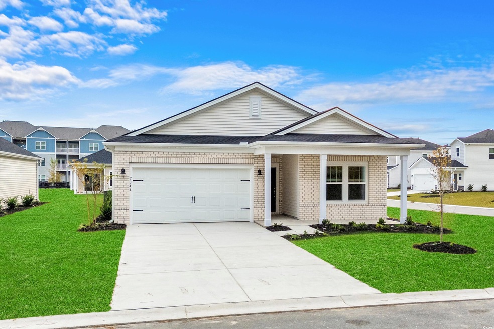 View of front facade featuring a front yard and a 