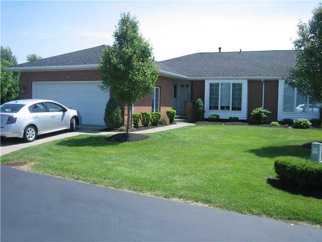 Exterior Front. Brick and vinyl ranch style townho