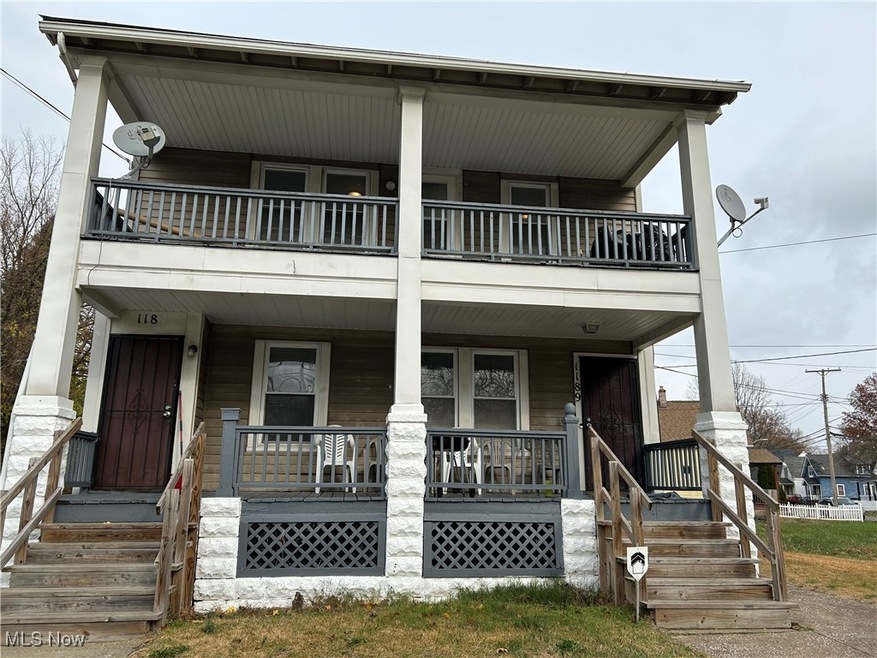 View of front of house with a porch and a balcony