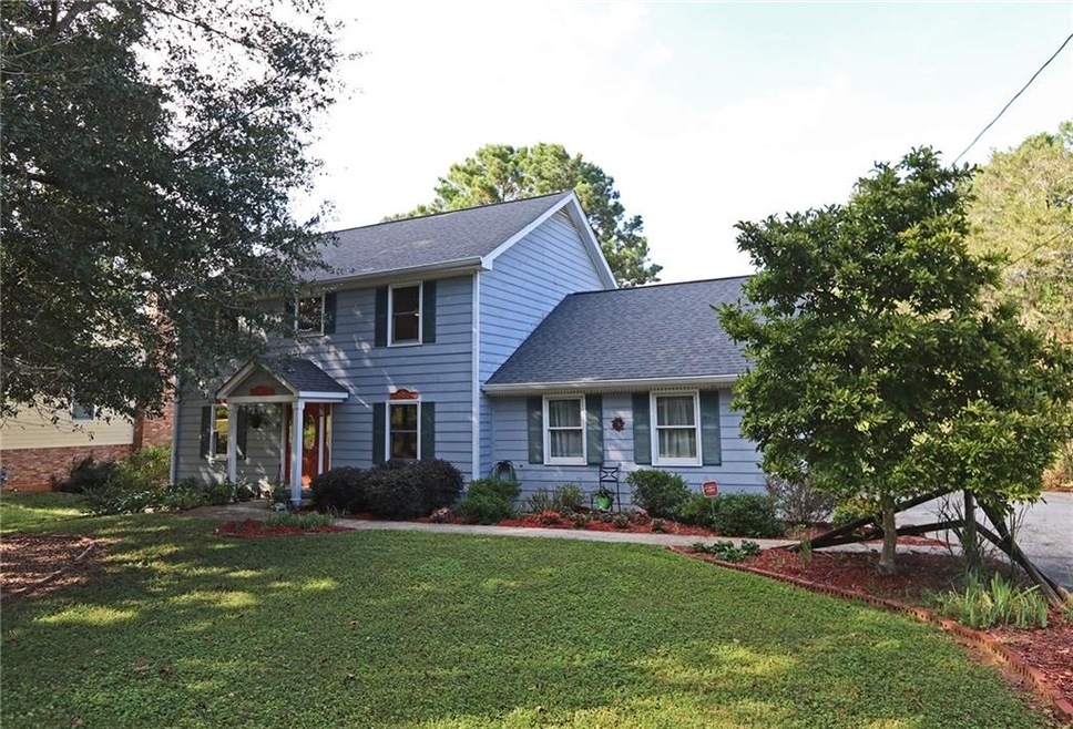 Lovely colonial with side entry garage, new roof n