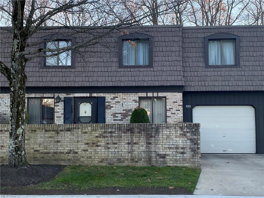 Front with attached garage