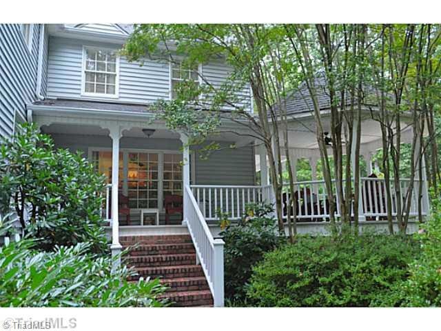 Exterior Front. Delightful big rambling farm style home with a charming porch & gazebo sits on the edge of Oak Hollow Lake