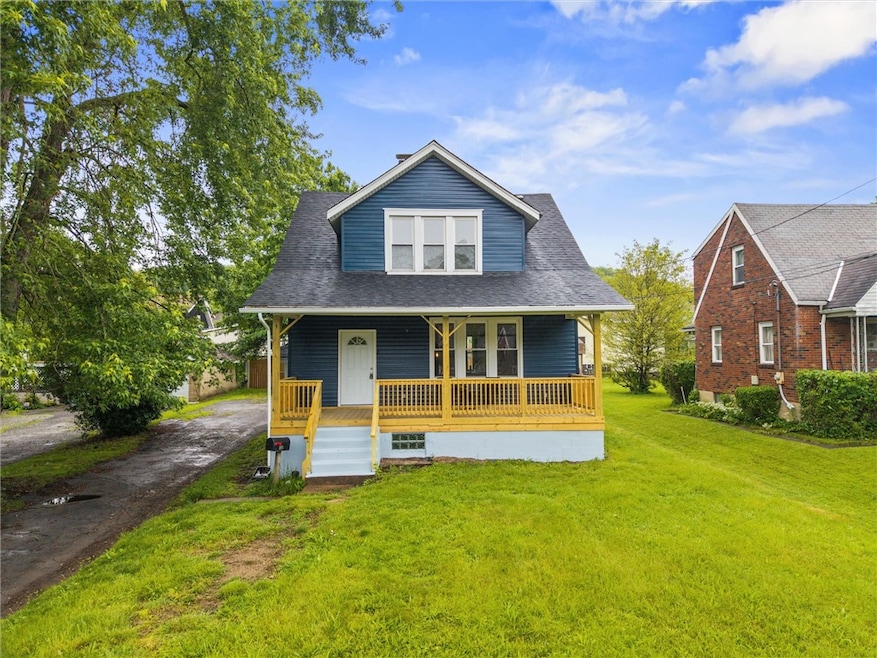 With its cheerful blue facade, this home offers in