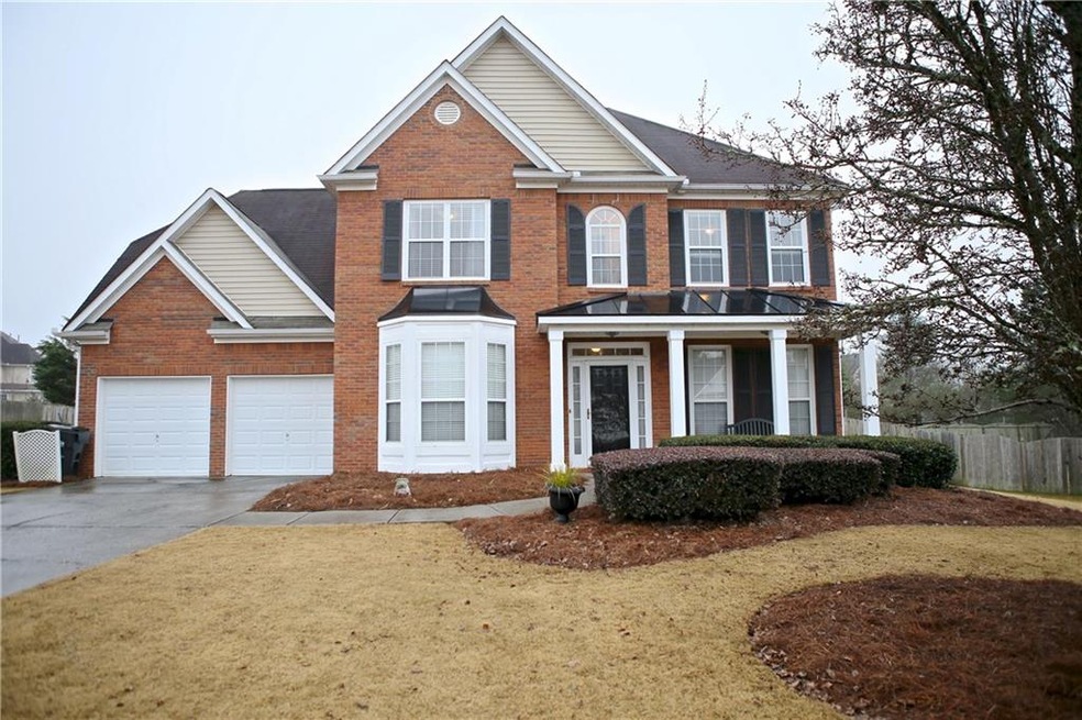 Charming traditional home in swim community with a