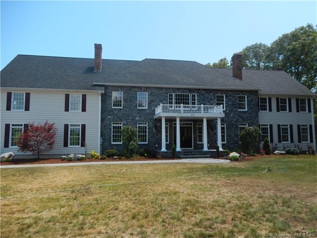 Welcome home to 12 Nathan Hale Drive!  Come in and