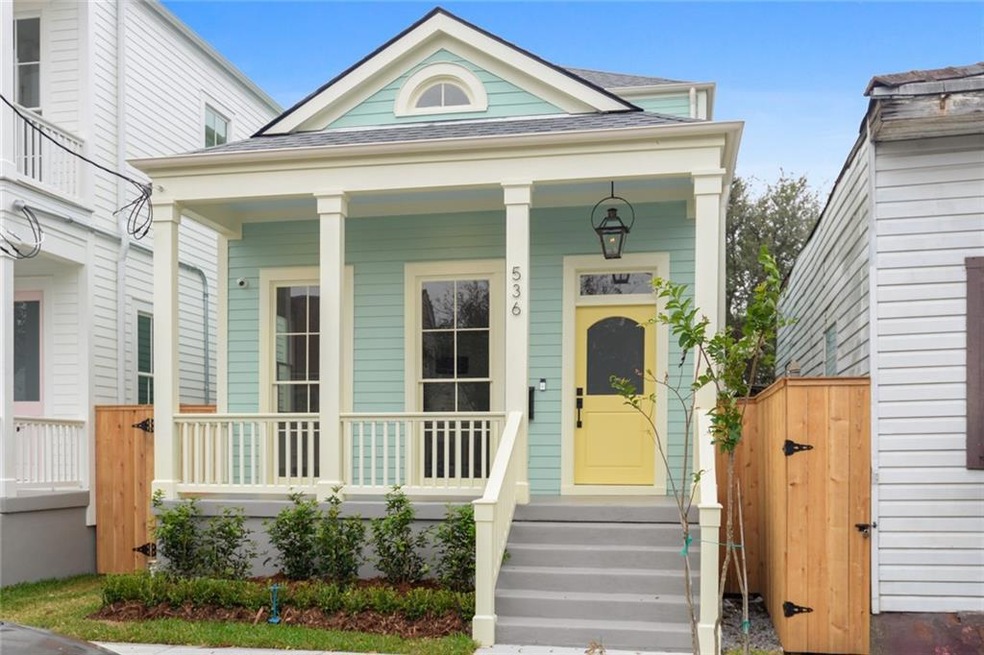 Exterior Front feats Custom 8' Historic Wood Windo