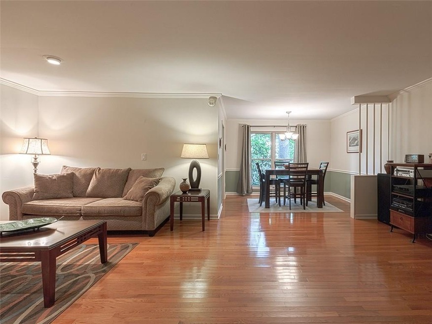 Spacious bright open floor plan.  Hardwoods throug
