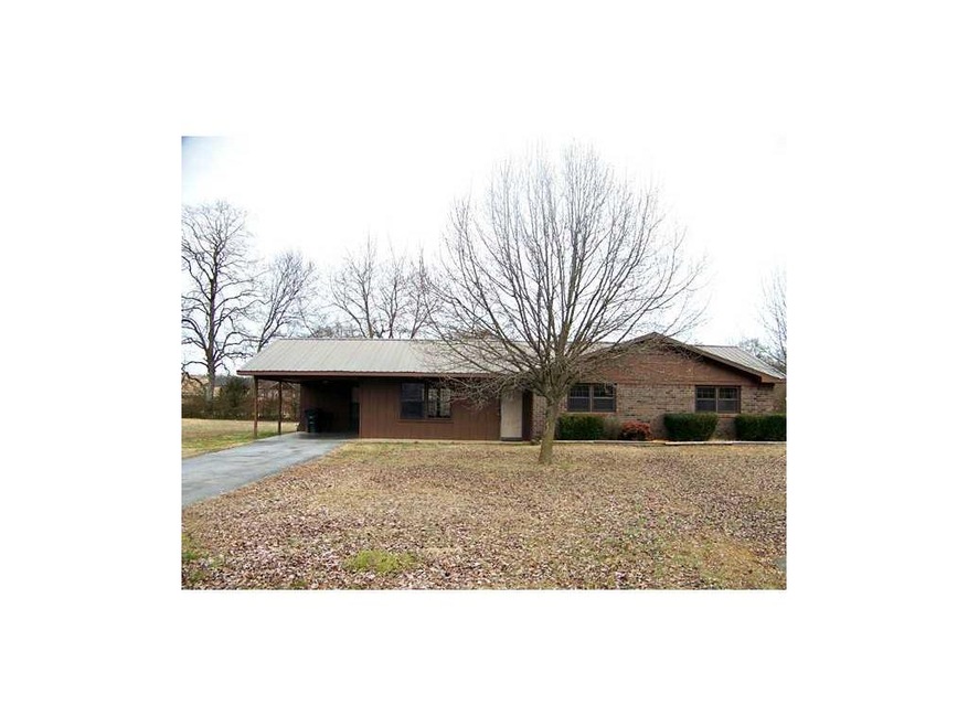 Exterior Front. Four-sided brick beauty with new f