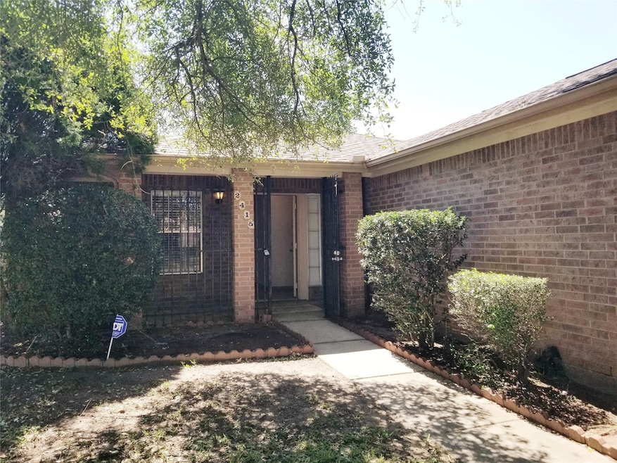 2415 Chapel. Welcoming porch and mature landscaping.