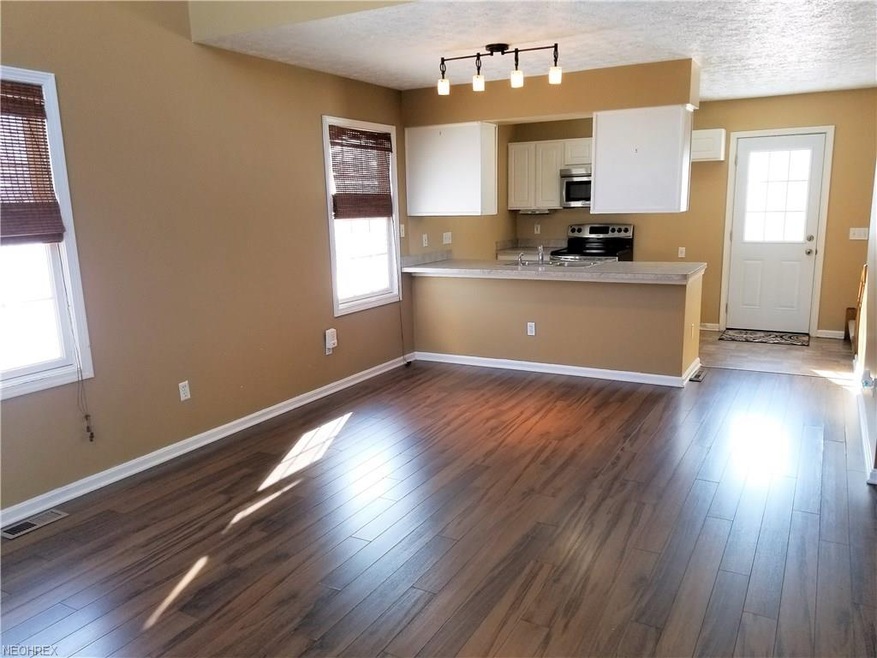 122 Harvest Ct unit 1, Lagrange, OH 44050 - photo 1