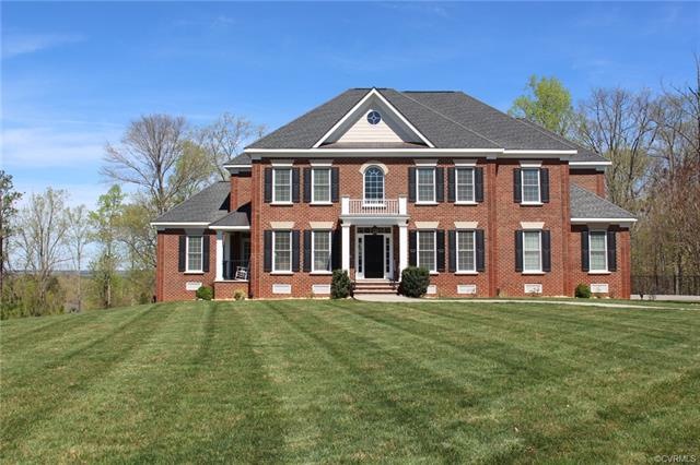 Beautifully situated on a private 1+ acre cul-de-s