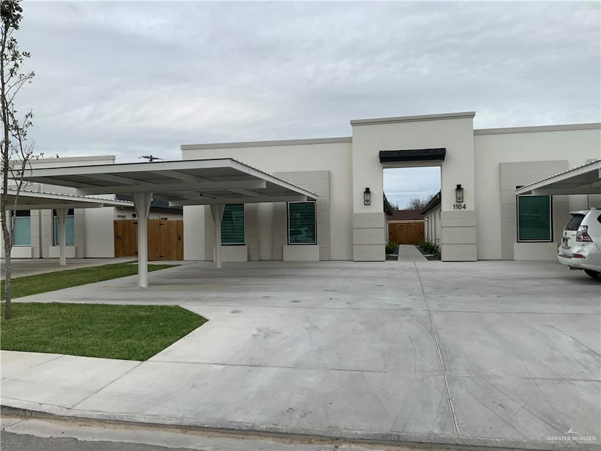 View of front of home featuring a carport